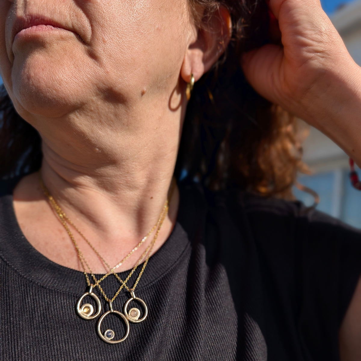 Orbital necklace